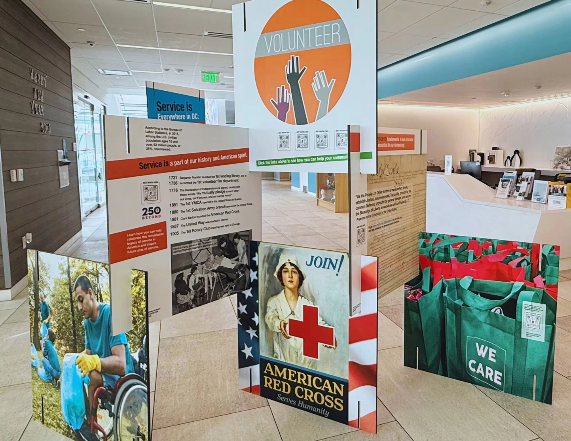 Arranged signs at exhibit showing information about service and volunteering
