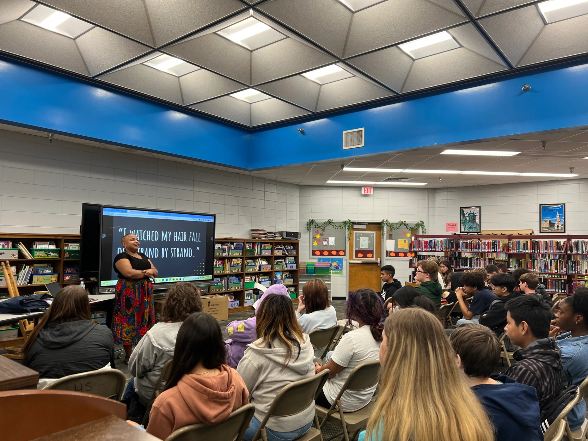 Sanah presenting to a high school classroom