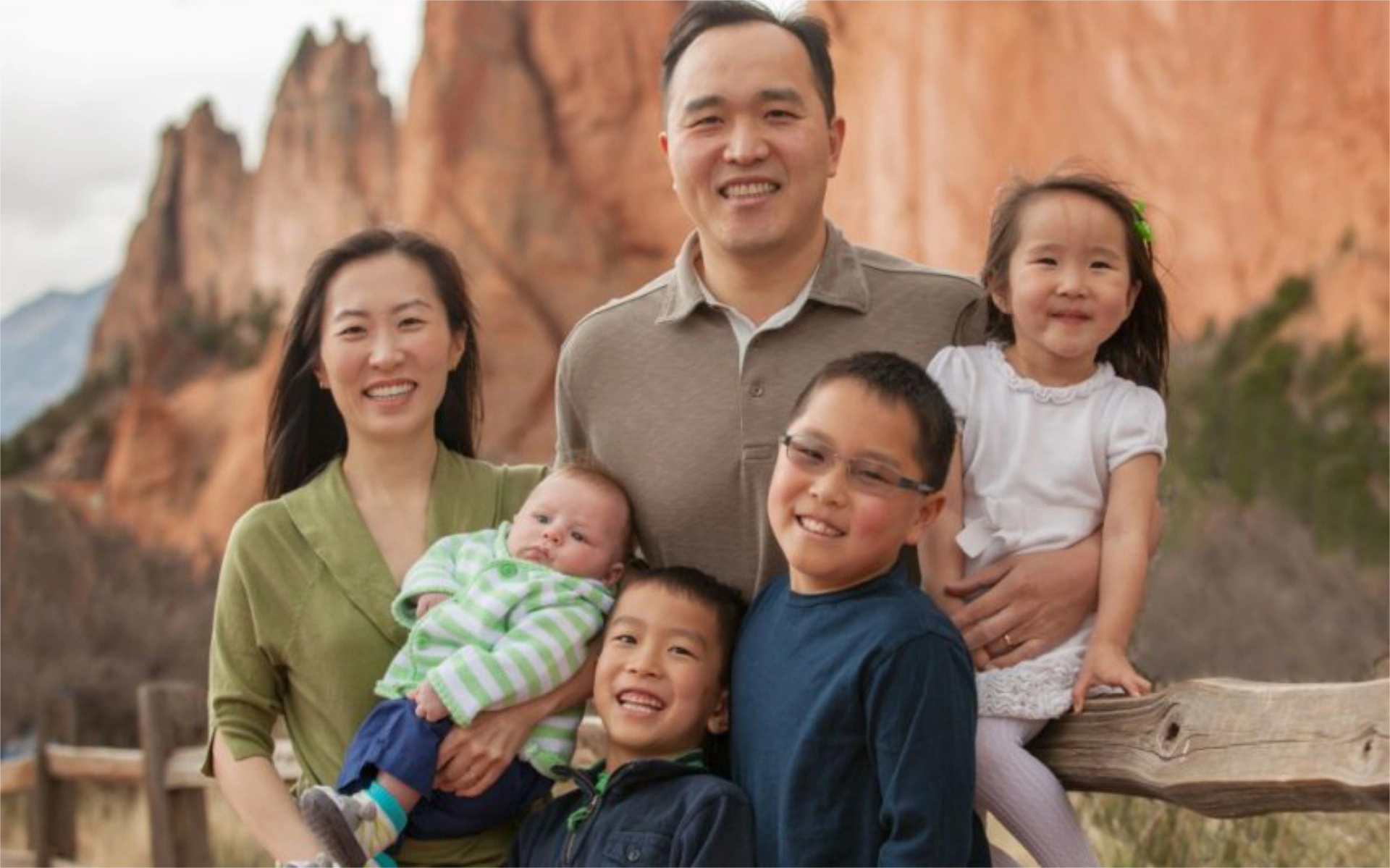 Vinh posing with his family