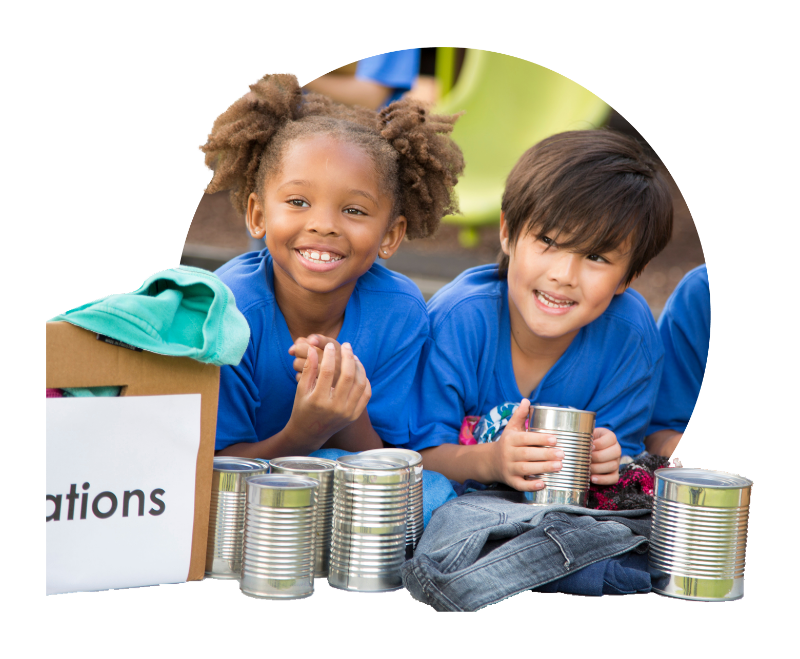 Two smiling children collecting food donations, with the canned goods and boxes extending outside the circle frame